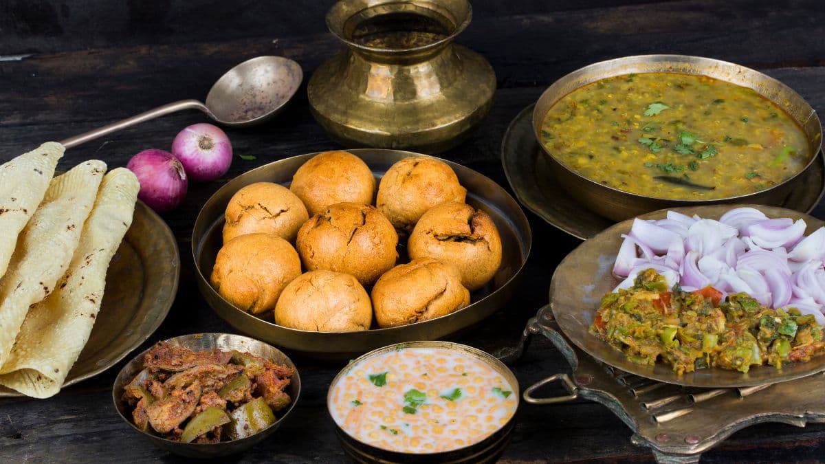 A feast of dal baati churma with accompaniments
