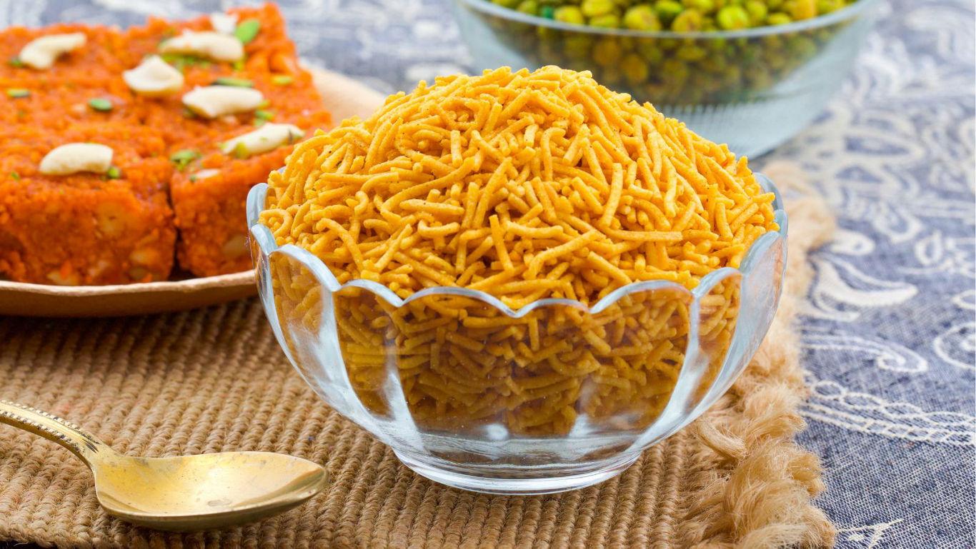 Glass bowl of crispy Indian sev snack
