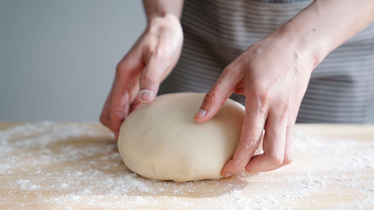 Khapli wheat atta dough in a round shape