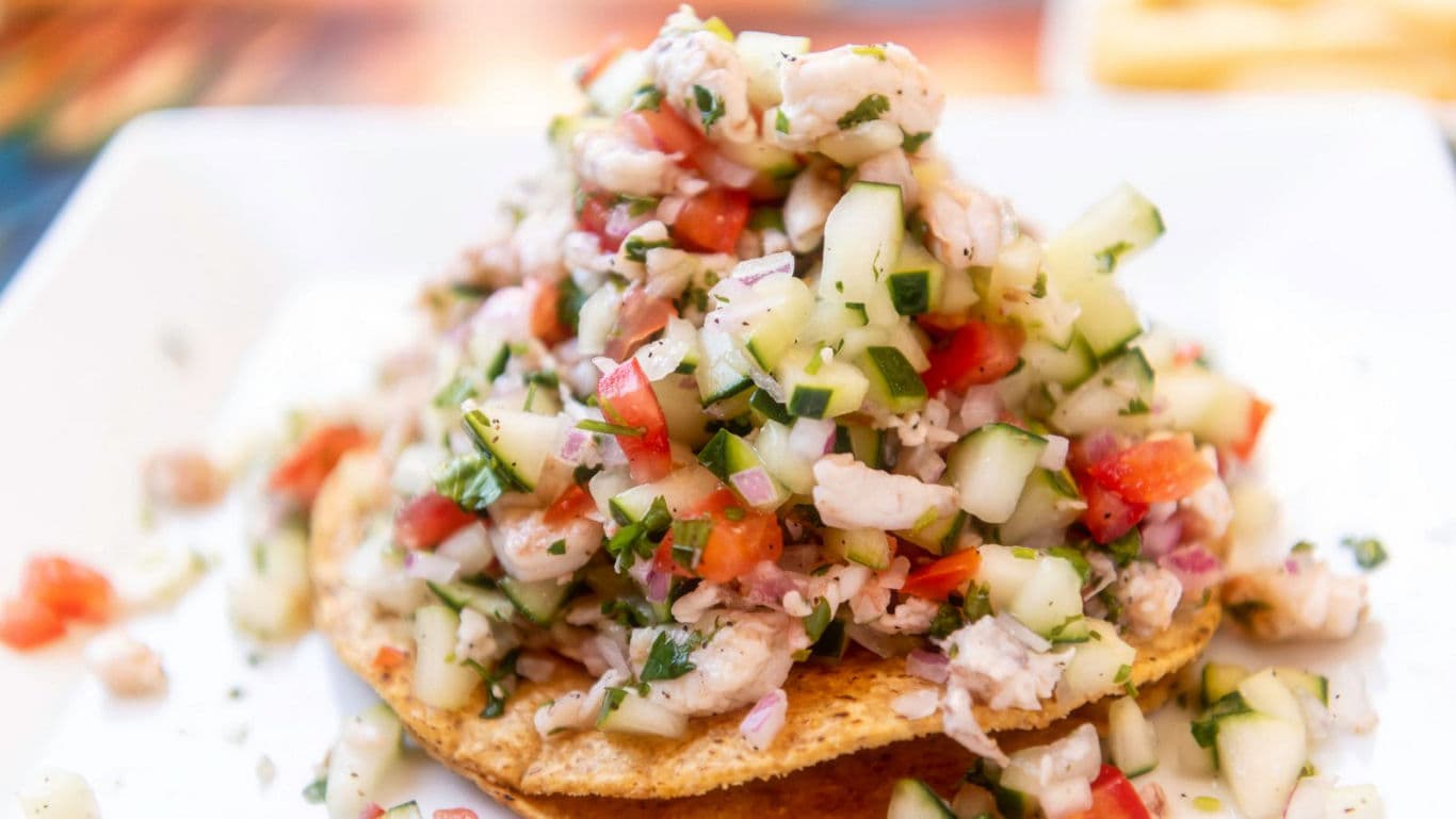 Fresh shrimp ceviche piled on tostada