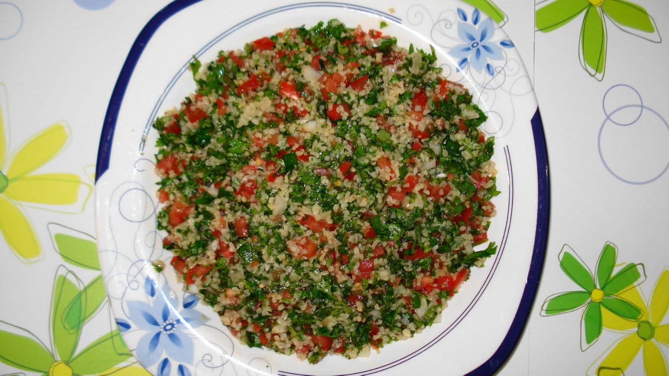 Fresh tabbouleh salad with parsley and tomatoes