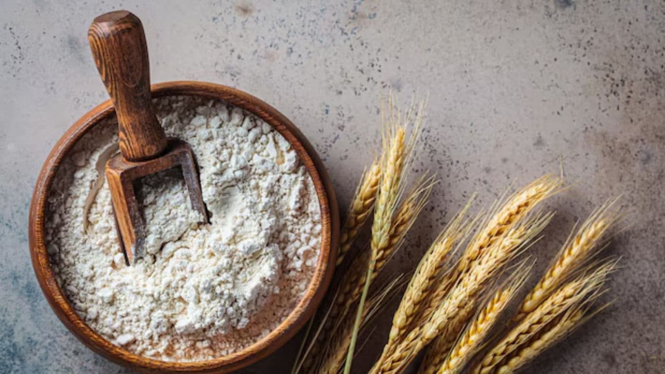 Wooden Bowl of Flour with Wheat Stalks