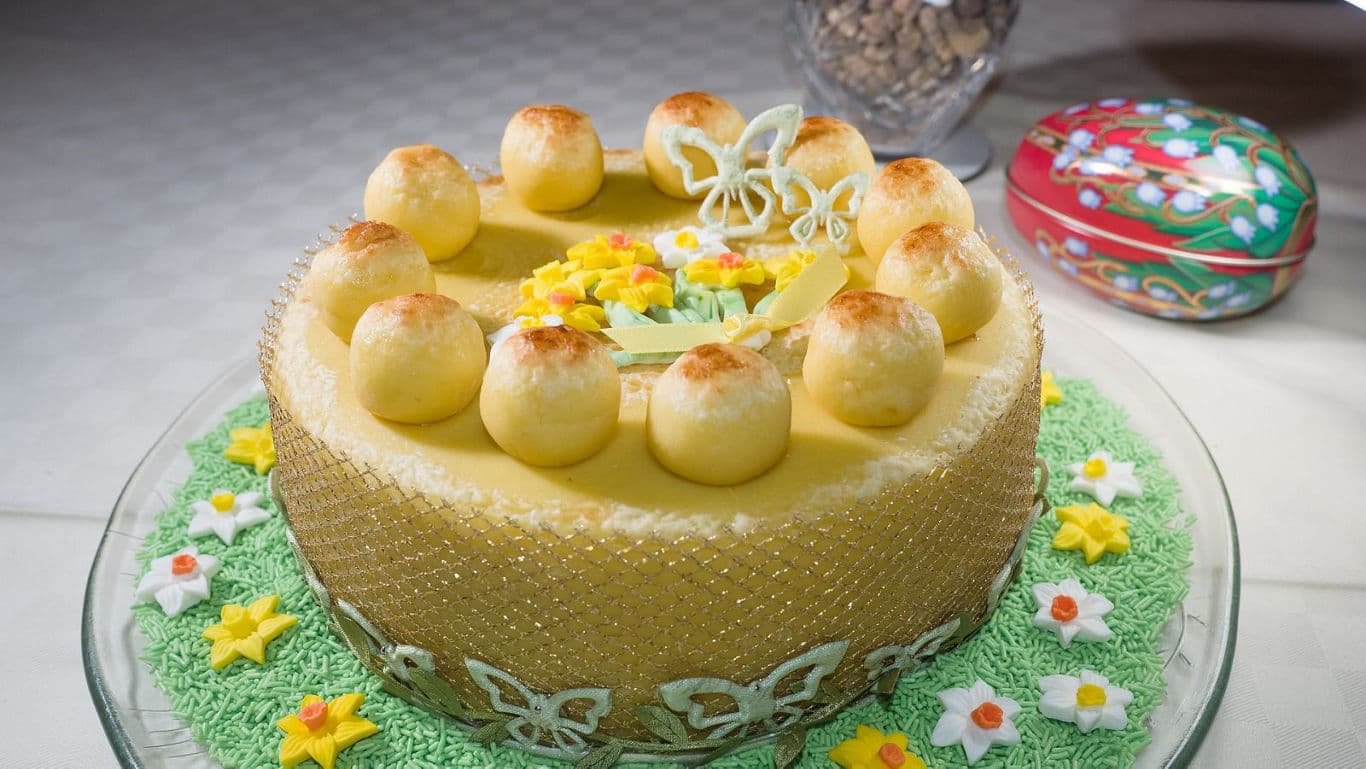 Decorative marzipan cake with floral icing details