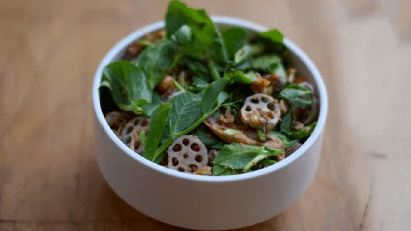 Fresh Lotus Root Salad with Greens in Bowl