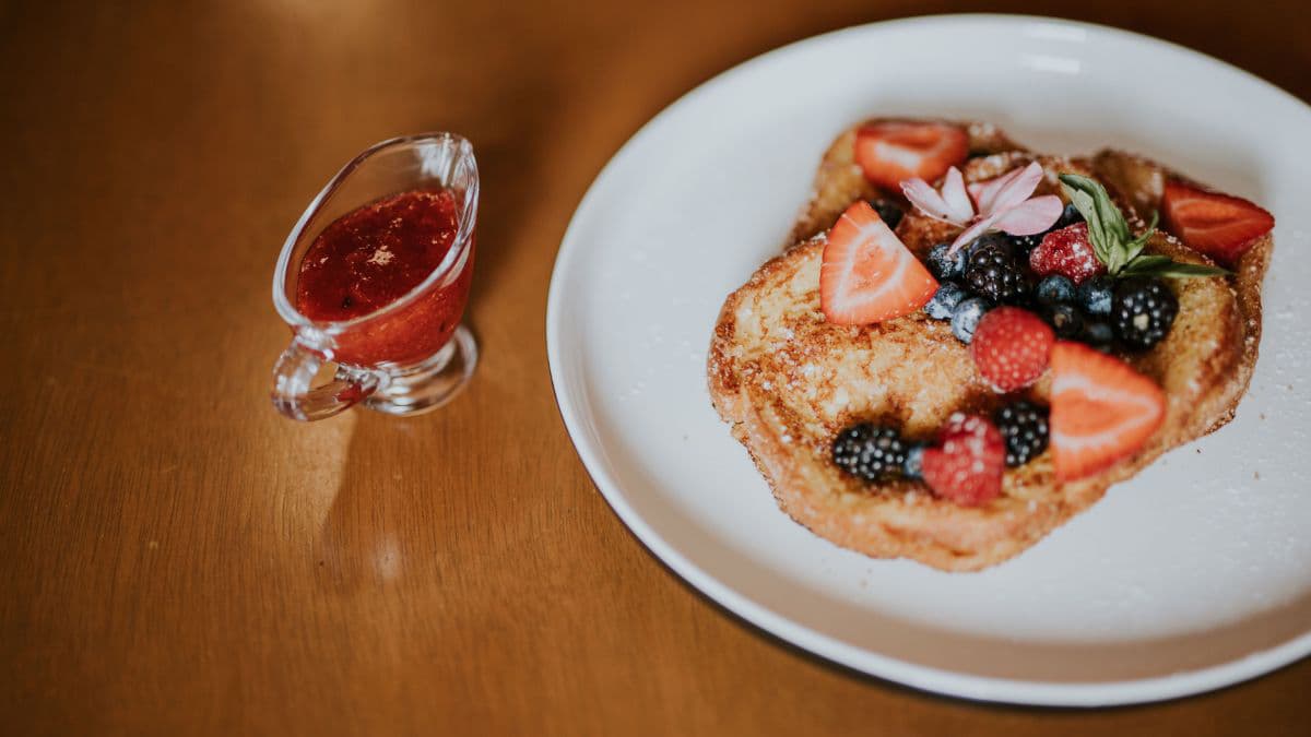 French toast with fresh berries and syrup