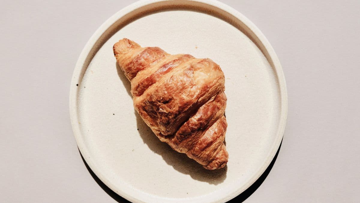 Golden butter croissant with flaky pastry layers