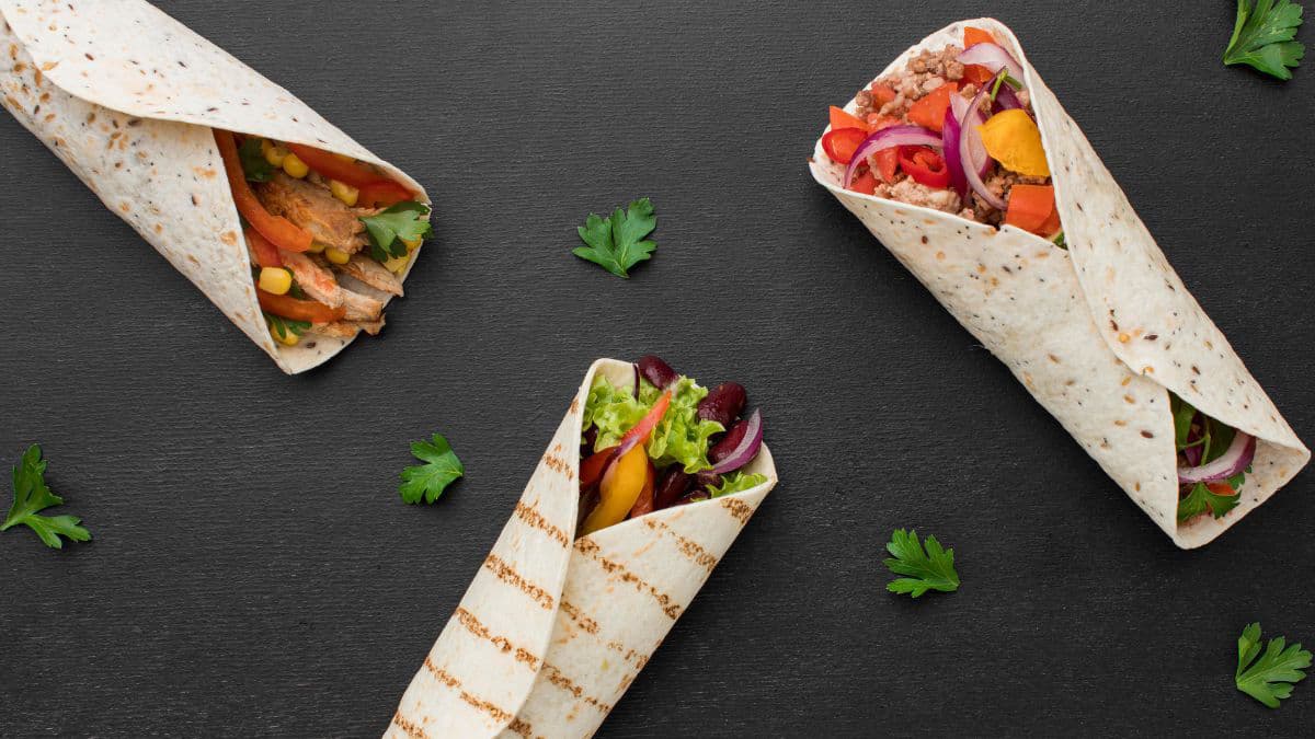 Fresh homemade Frankie wraps with colourful fillings 