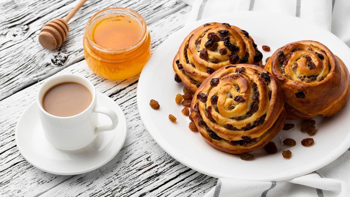 Warm homemade cinnamon rolls served with coffee