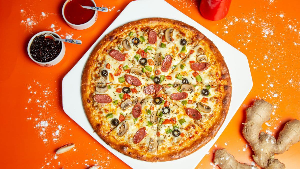 Gather fresh ingredients for homemade pizza.