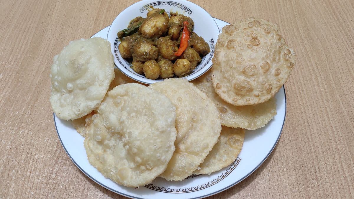 Soft Bengali luchi served with aloo dum