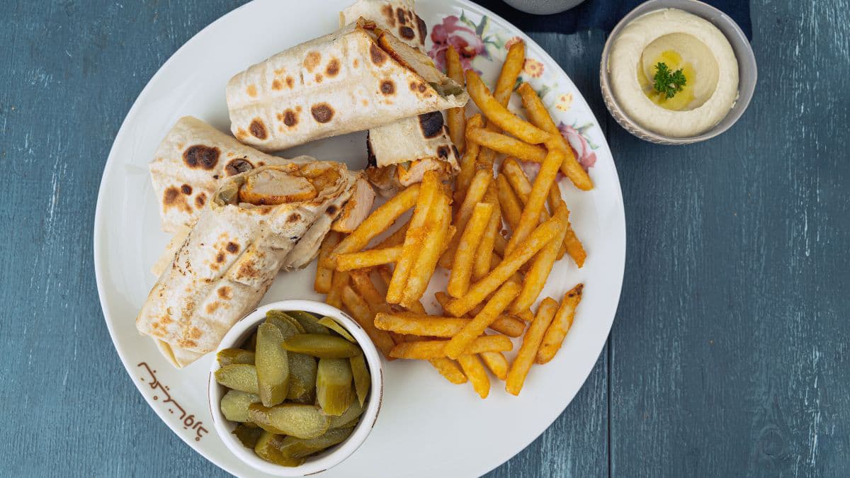 Bhakri wrap served with crispy fries