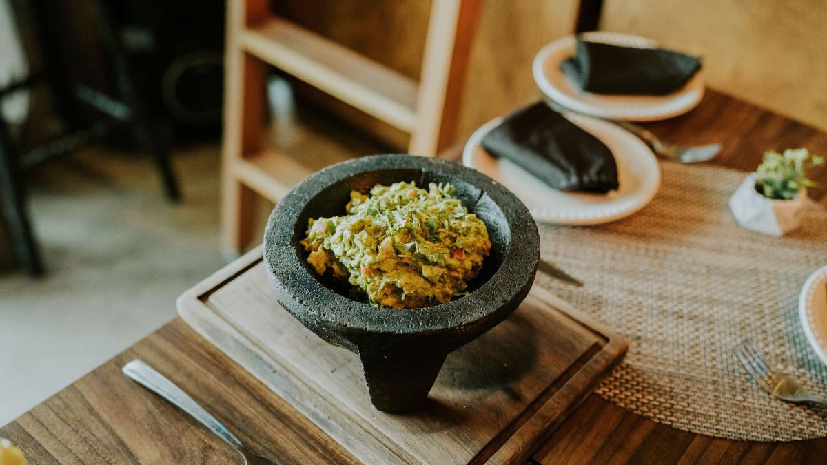 Creamy homemade guacamole with chunky texture 