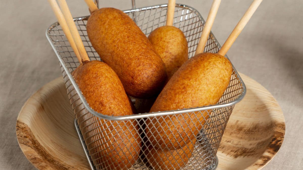  Delicious corn dog in a wire rack