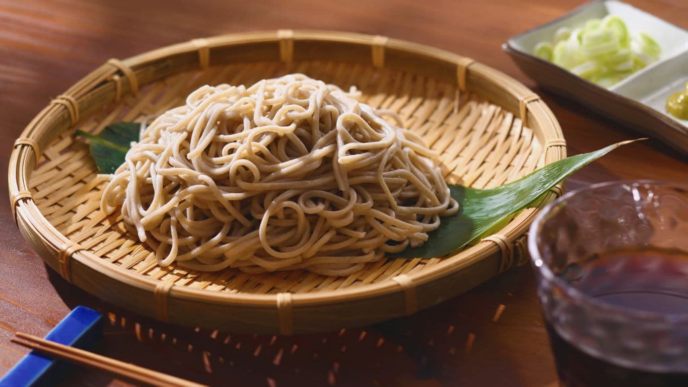 Traditional Japanese soba noodles served on bamboo tray