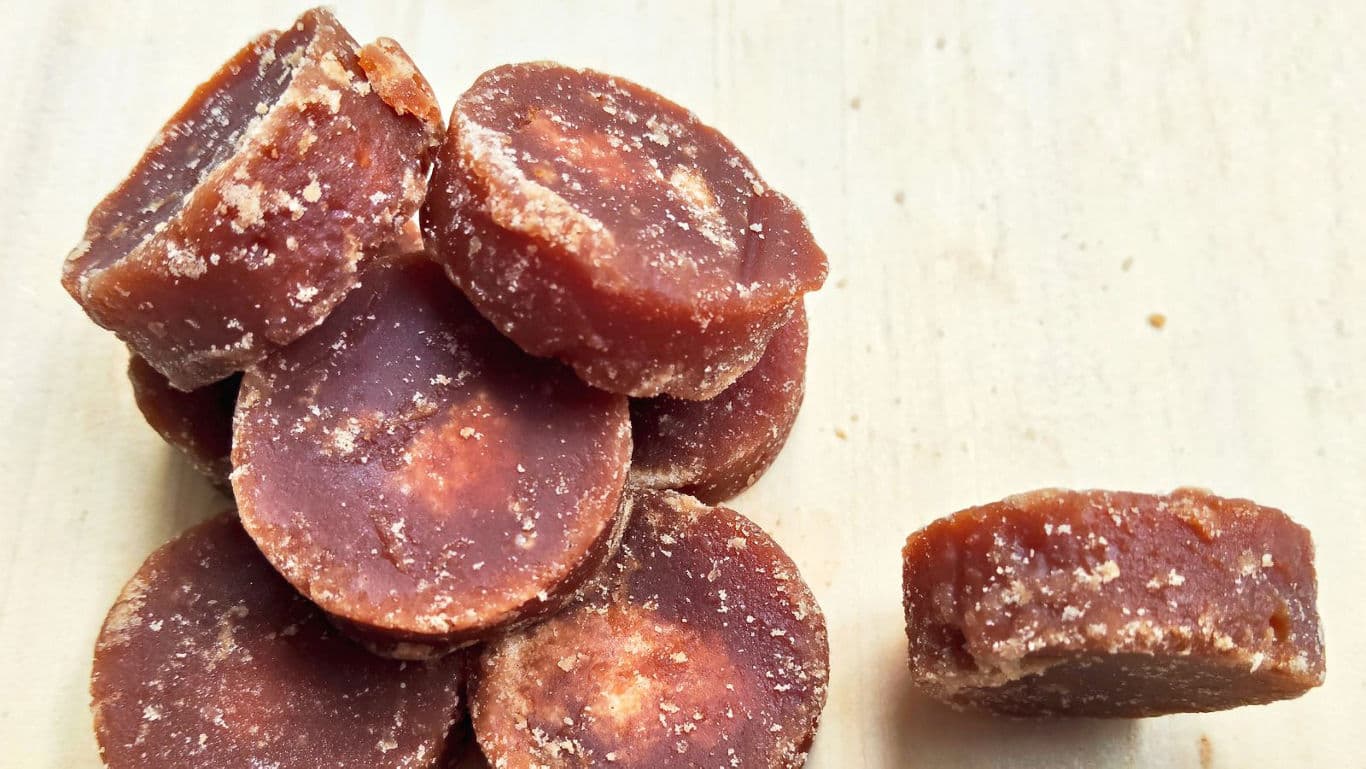 Stack of brown sugar candy discs