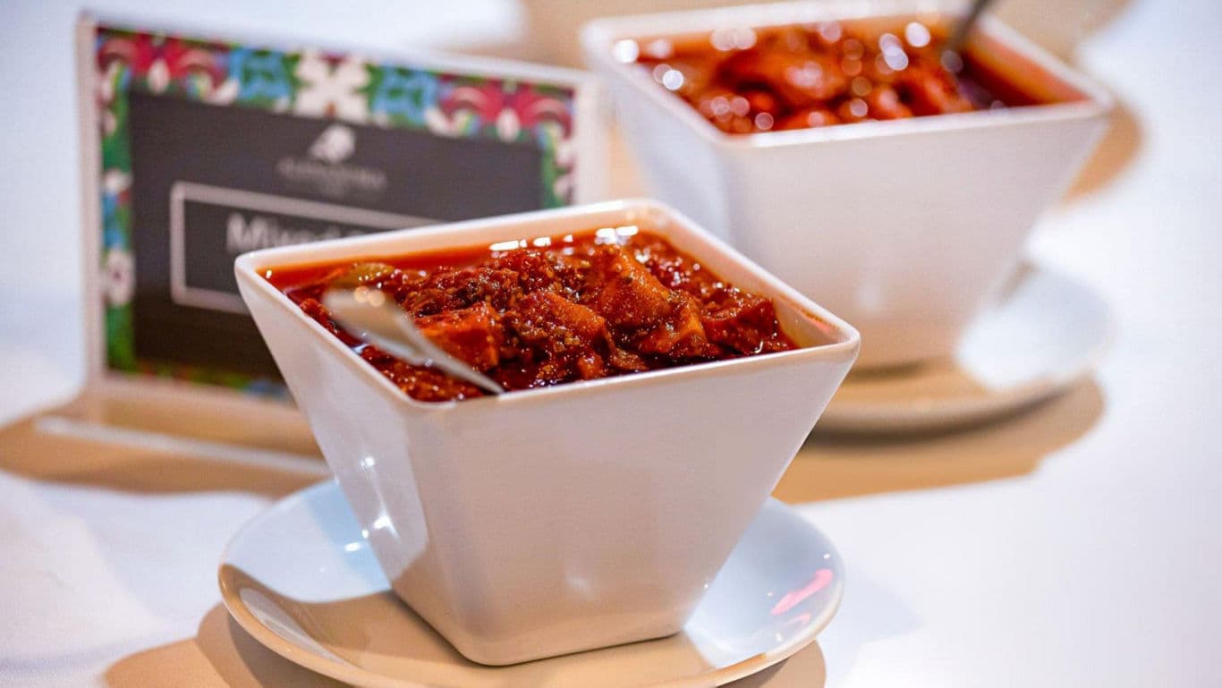 Square Bowls of Spicy Red Curry Dish