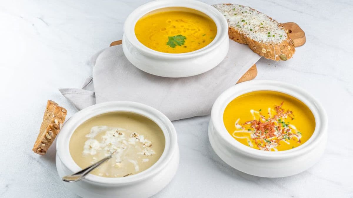 Soup bowls with bread on the side
