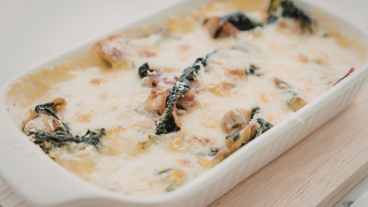 Spinach and Mushroom Bake on wooden tray