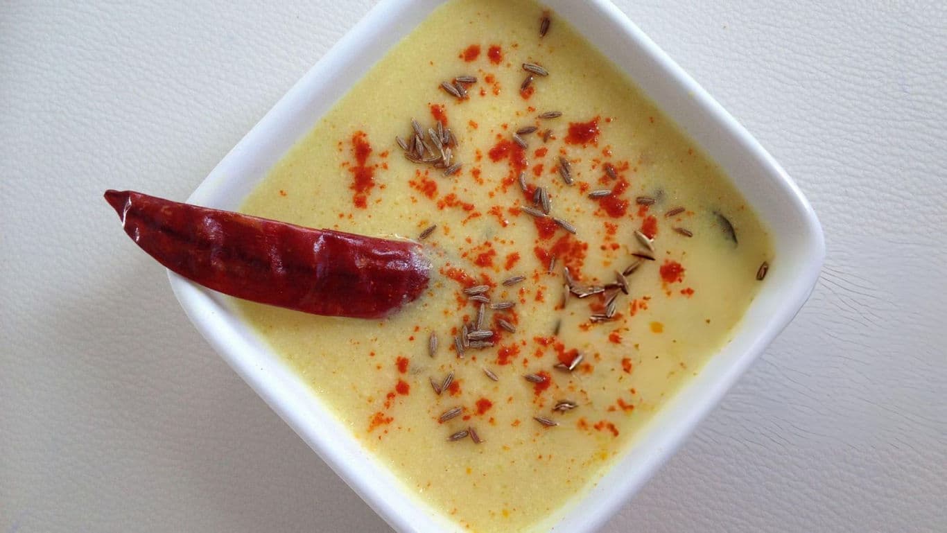 Spiced yogurt curry with red chili