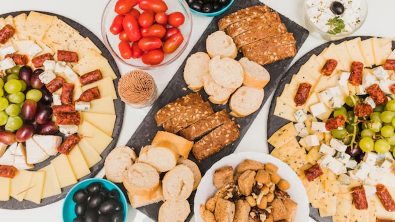 Assorted Cheese Platters with Bread and Fruit