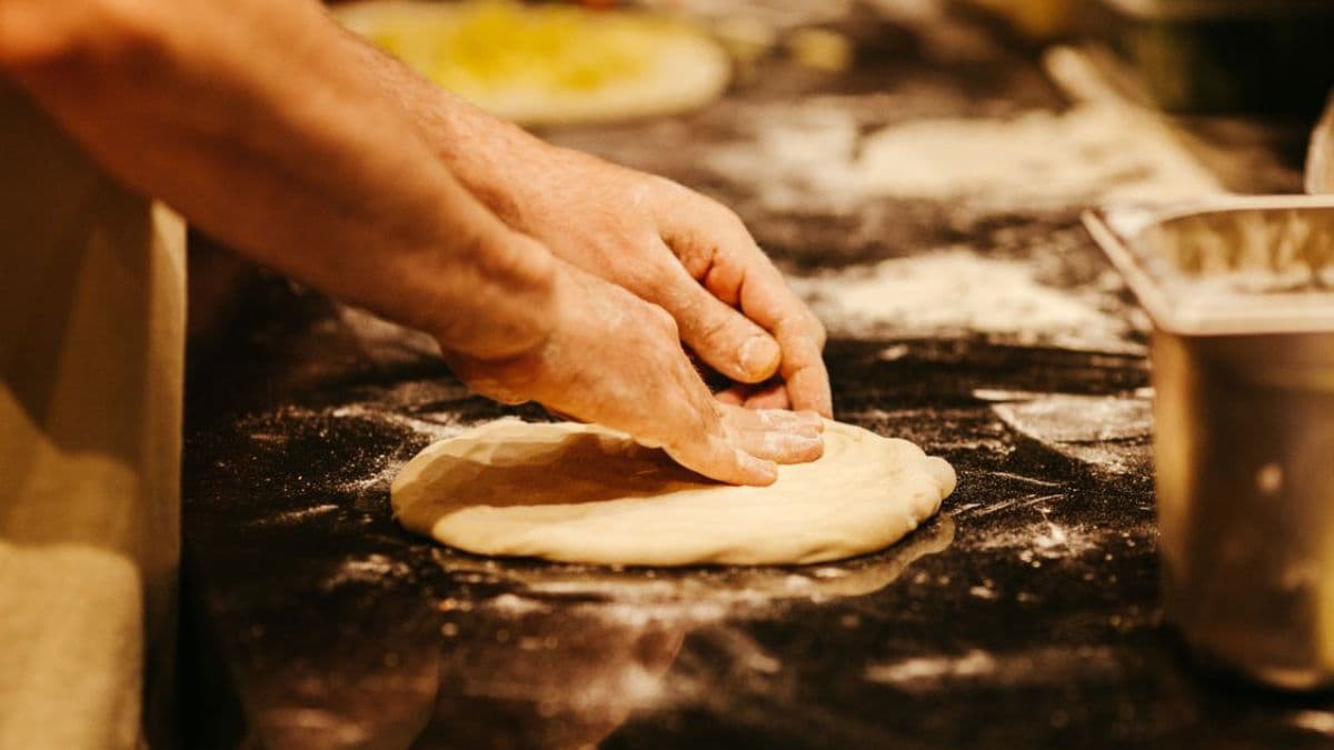 Turning khapli wheat pizza dough into pizza base