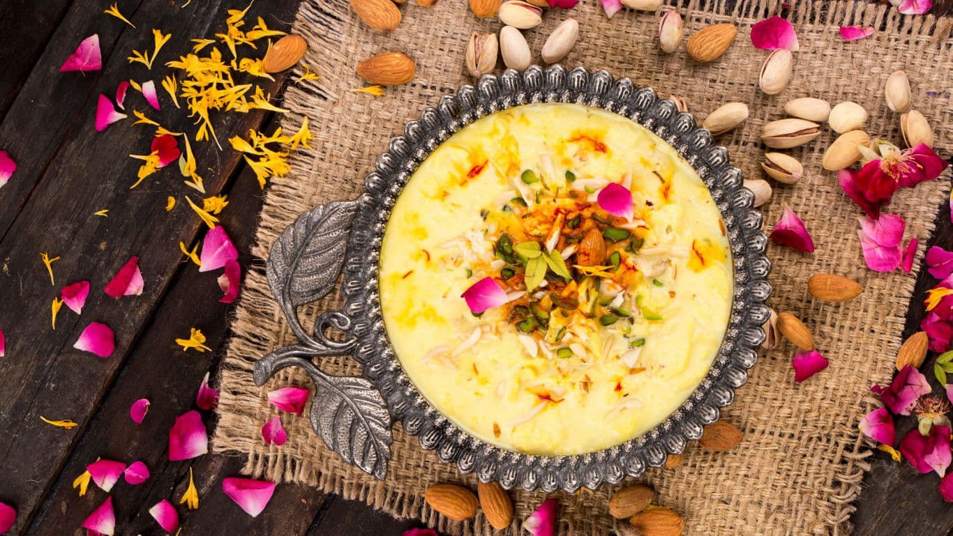 Traditional Indian Kesar Pista Kheer in Silver Bowl