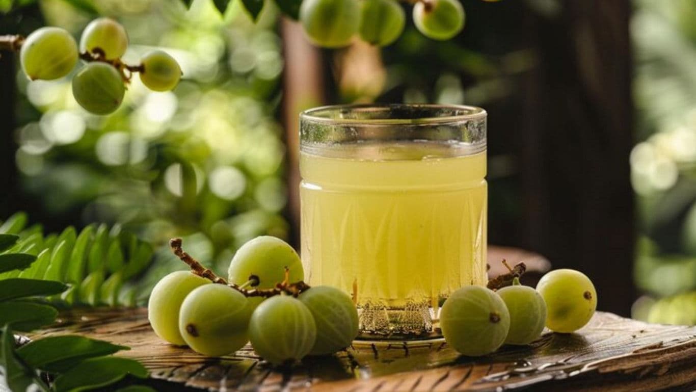 Fresh amla juice with whole fruits