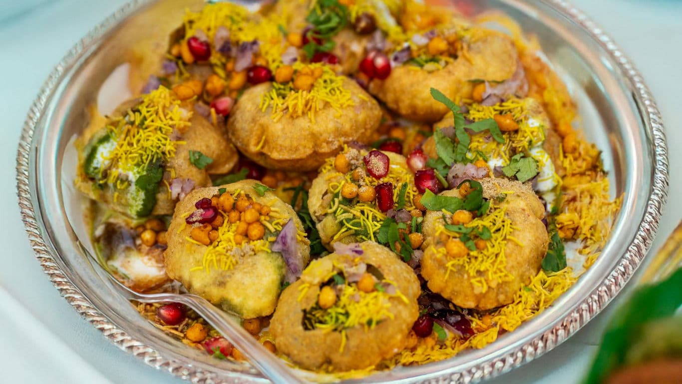 Colorful Indian chaat served on platter