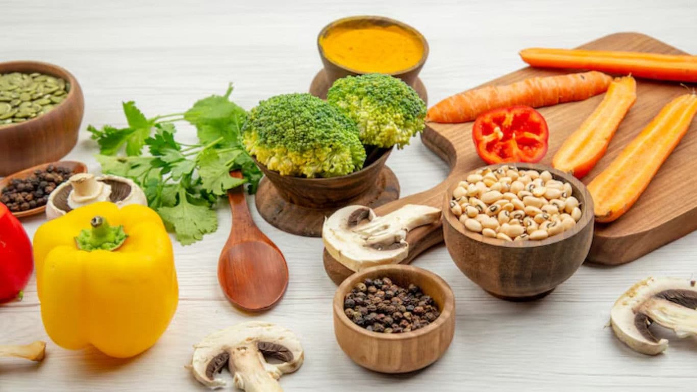 Fresh Vegetables and Spices on Wooden Table