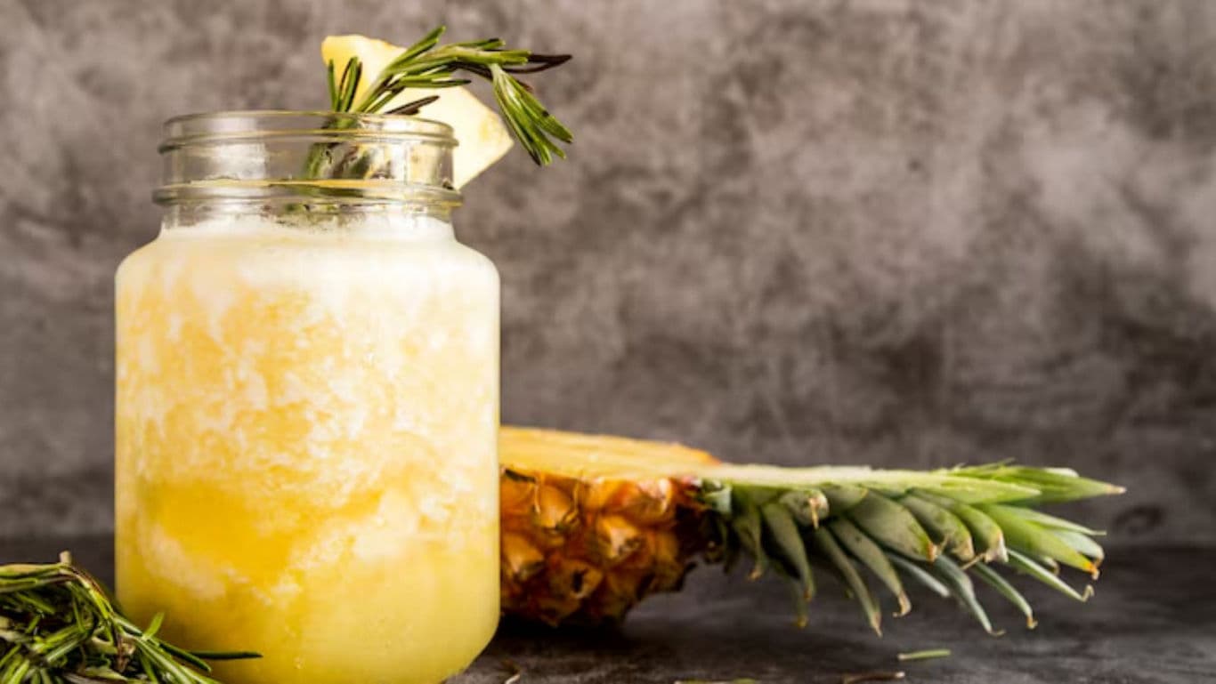 Pineapple smoothie in glass jar