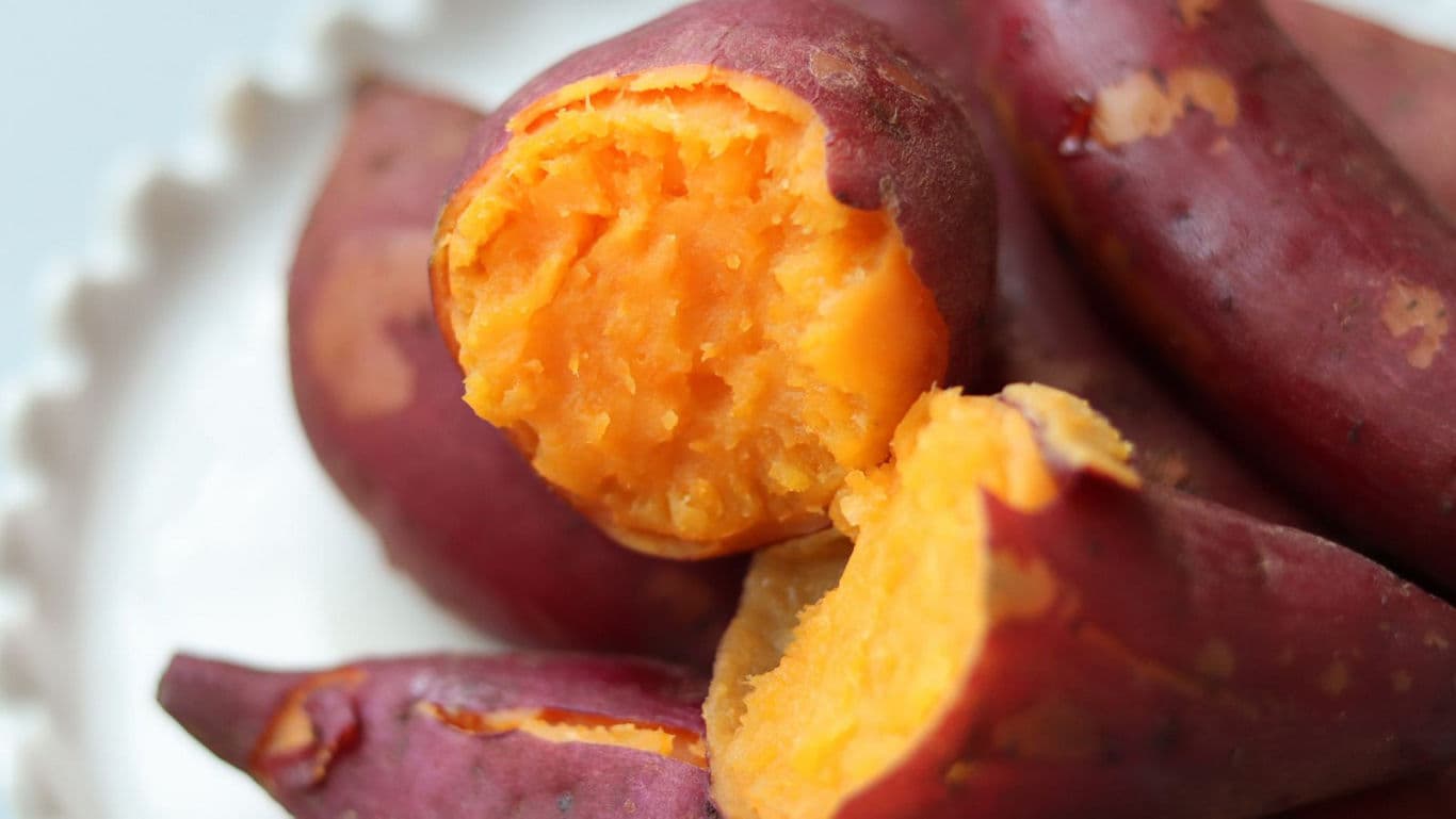 Close-up of cooked sweet potatoes on plate