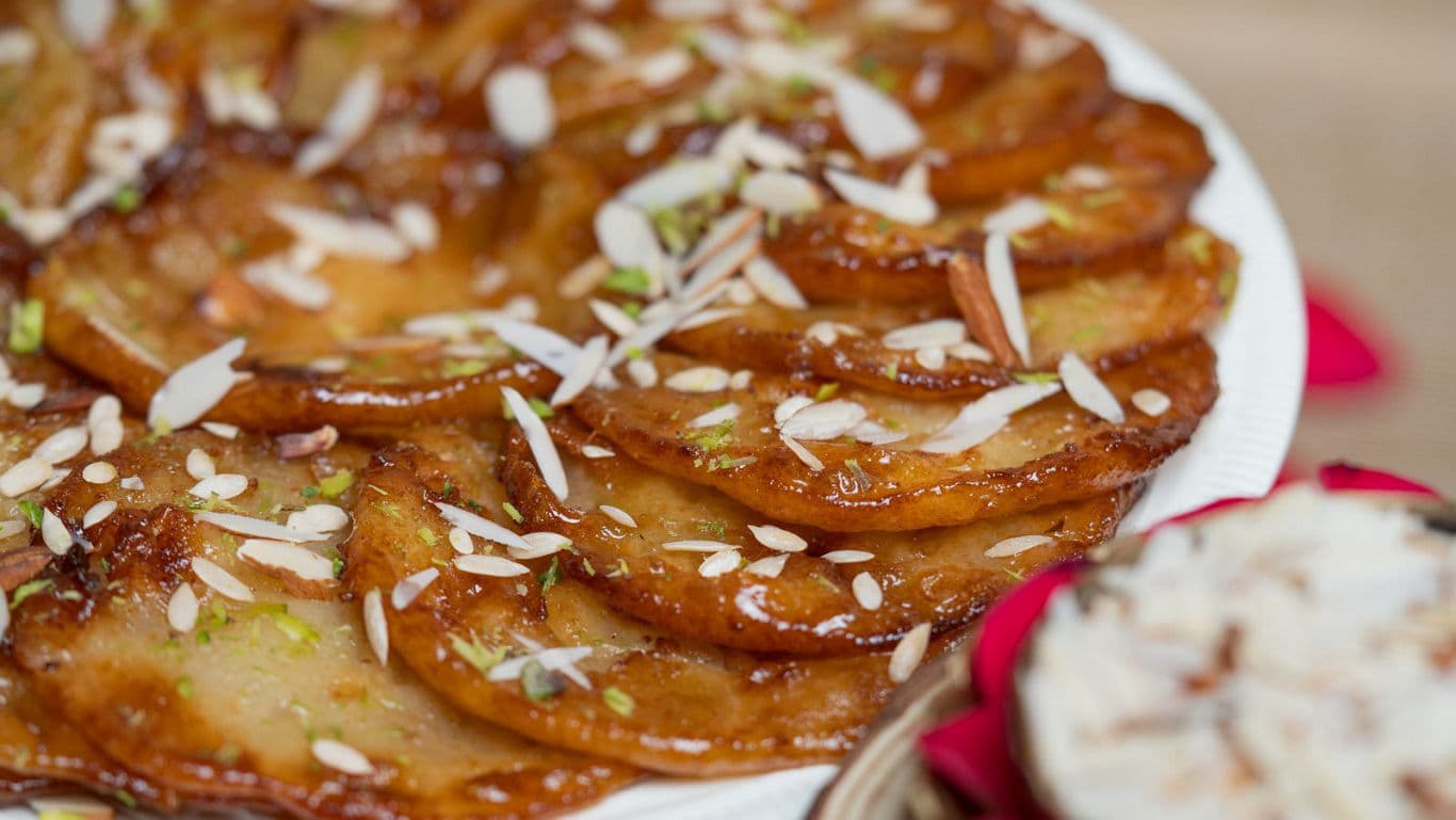 Close-up of syrupy Indian sweet malpua