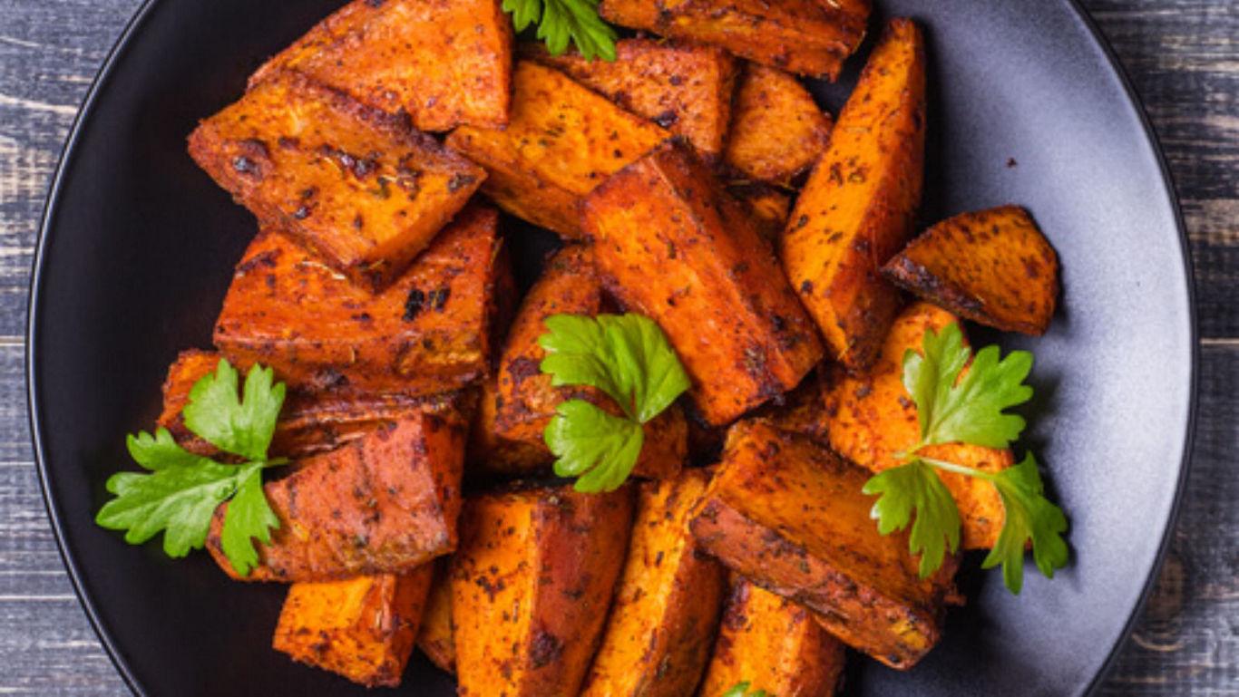 Roasted sweet potato wedges with herbs