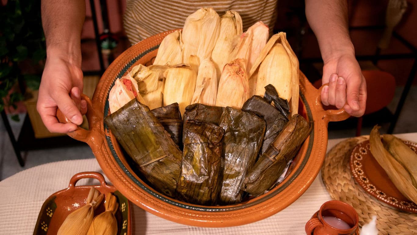 Traditional tamales served in ceramic dish