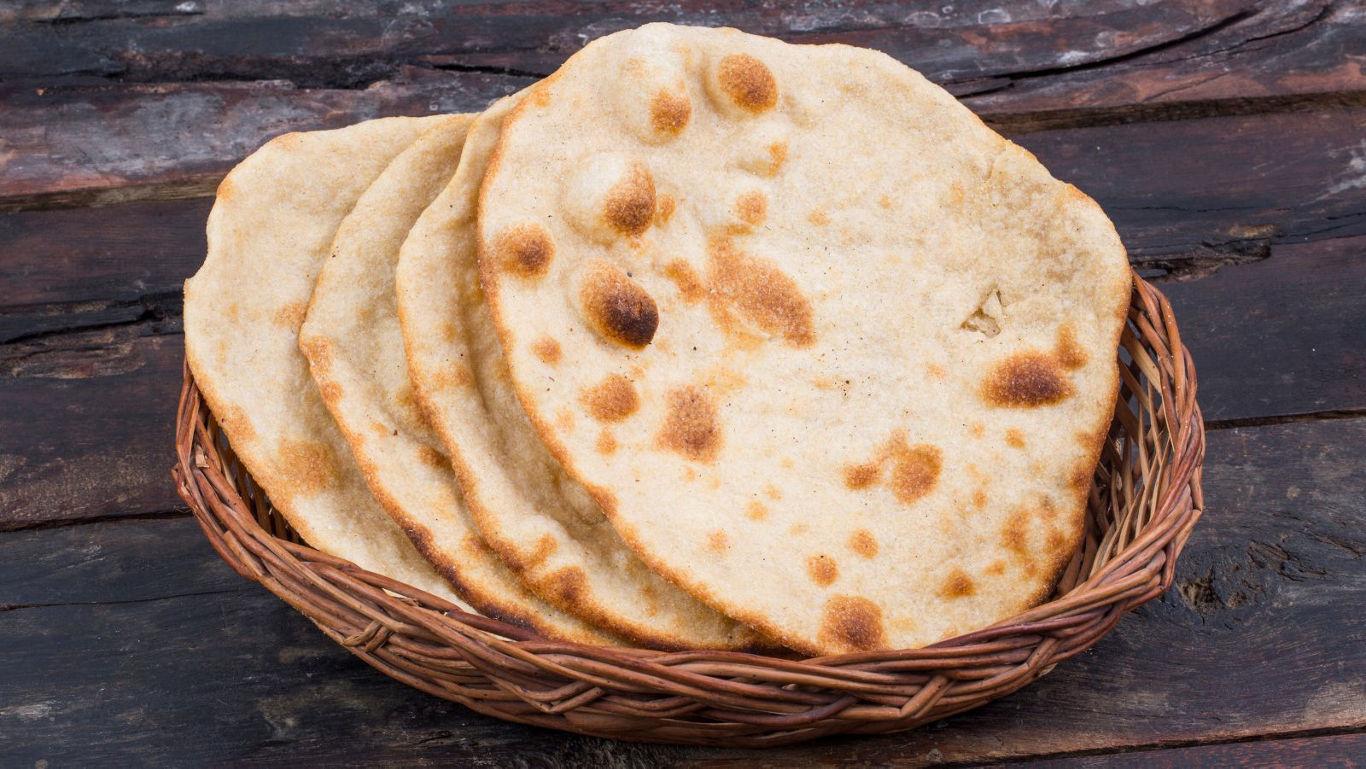 Fresh flatbreads in woven basket
