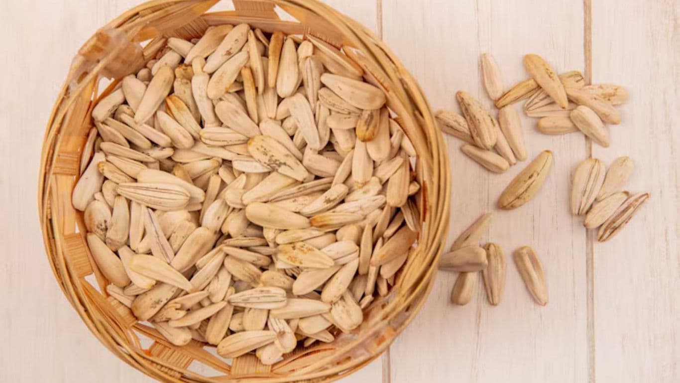 Basket of Sunflower Seeds on Wooden Table