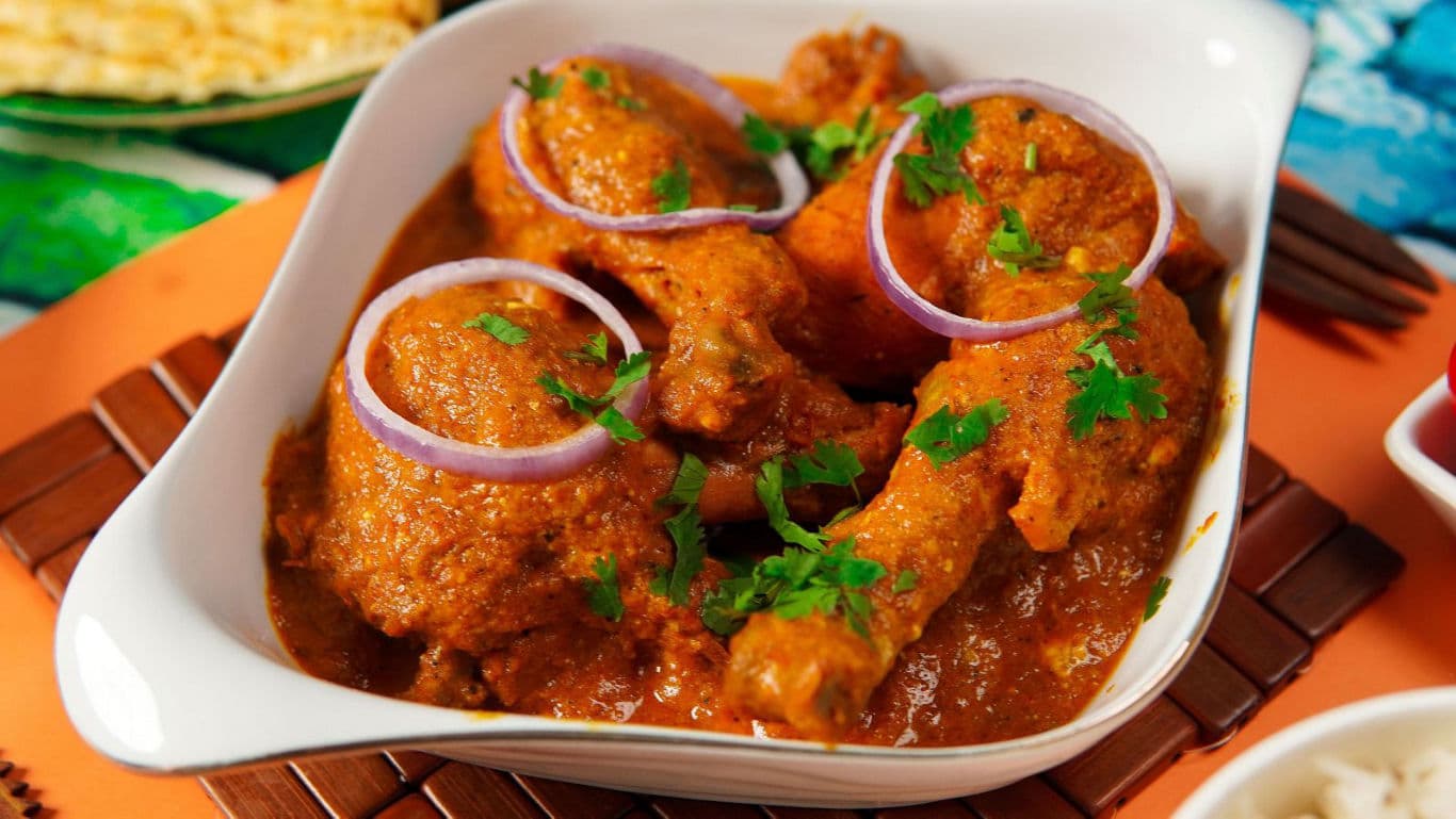 Spicy chicken curry with fresh herbs
