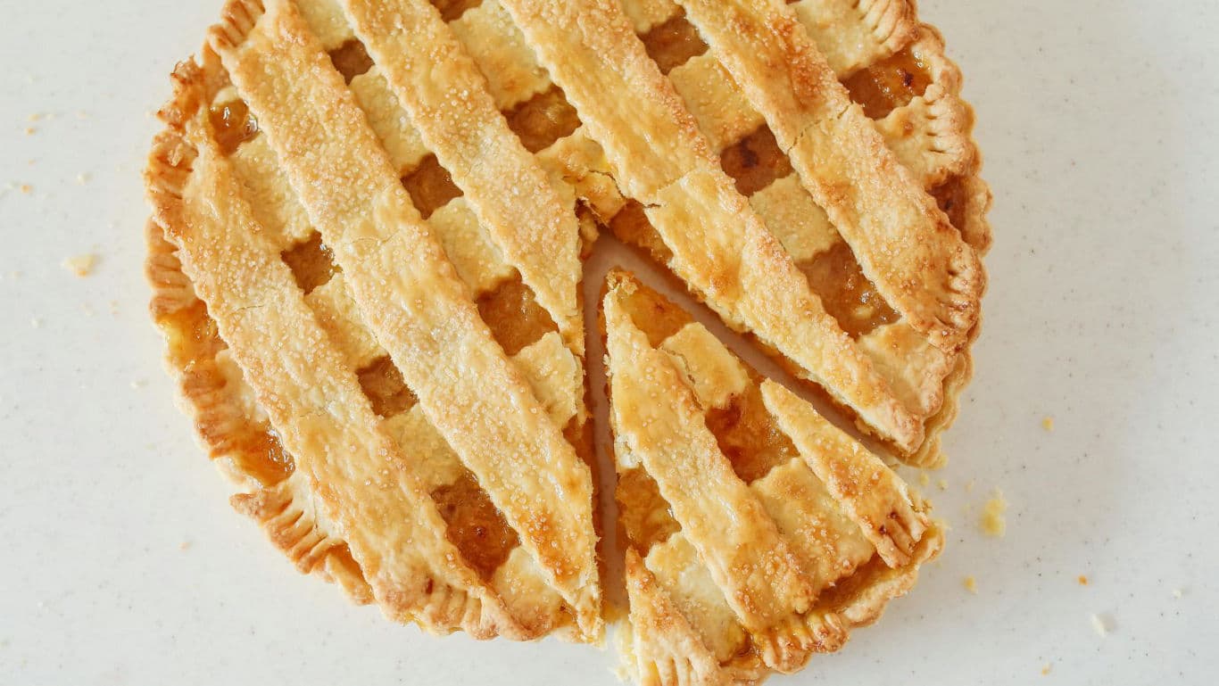 Whole lattice crust pie with single slice