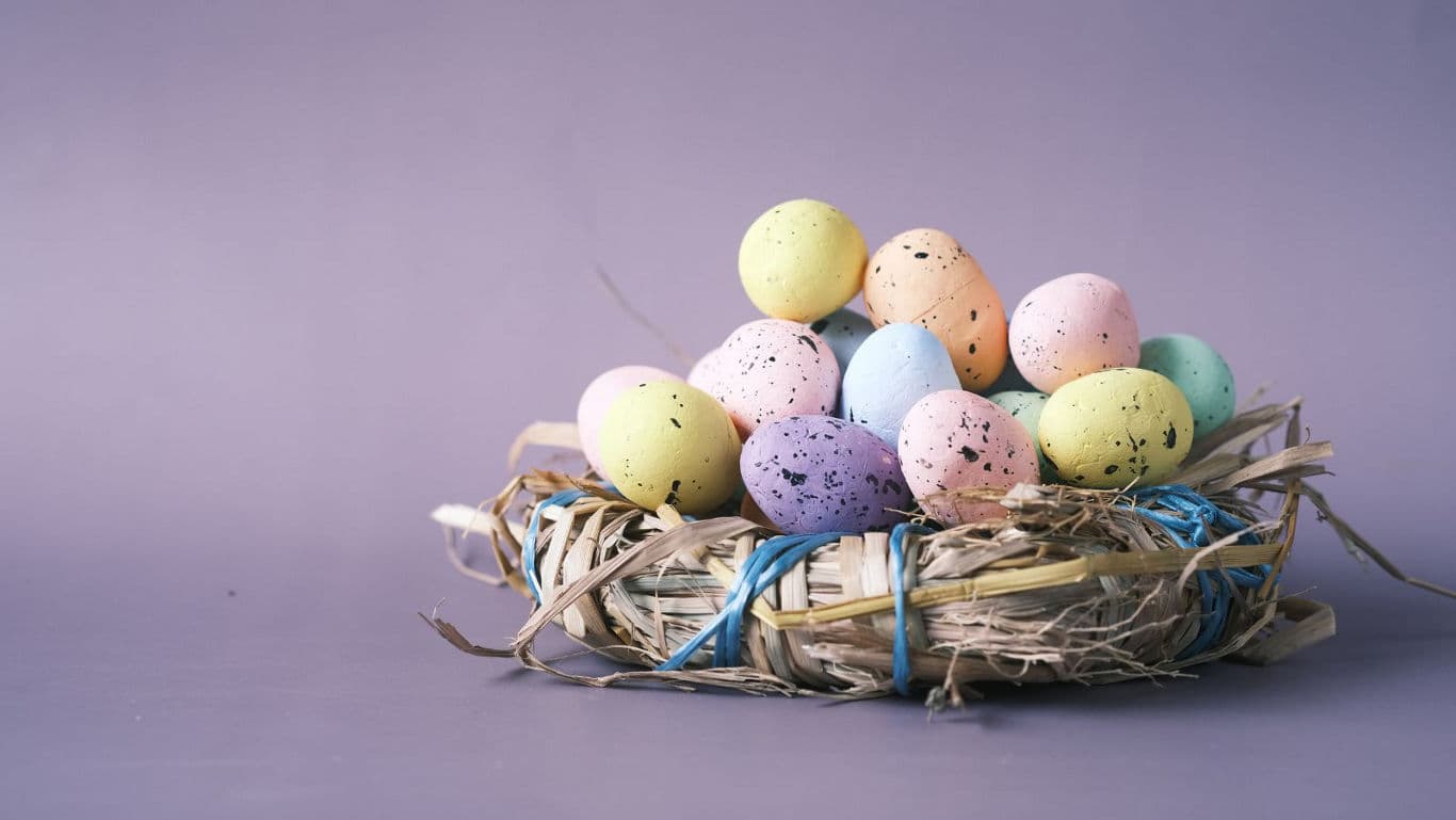 Colorful Speckled Easter Eggs in Straw Nest