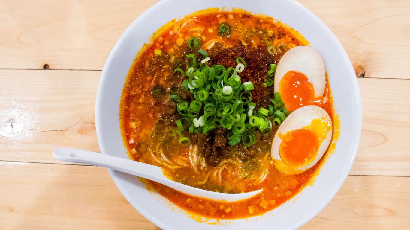 Spicy ramen bowl with soft boiled eggs