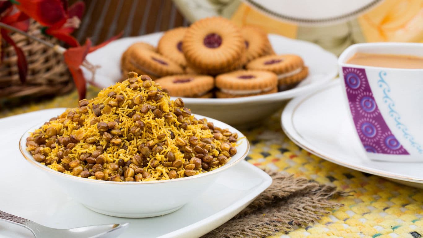 Indian Namkeen Snack with Biscuits and Tea