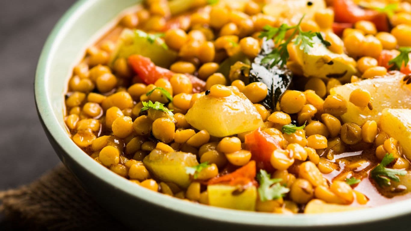 Bowl of lentil curry with vegetables