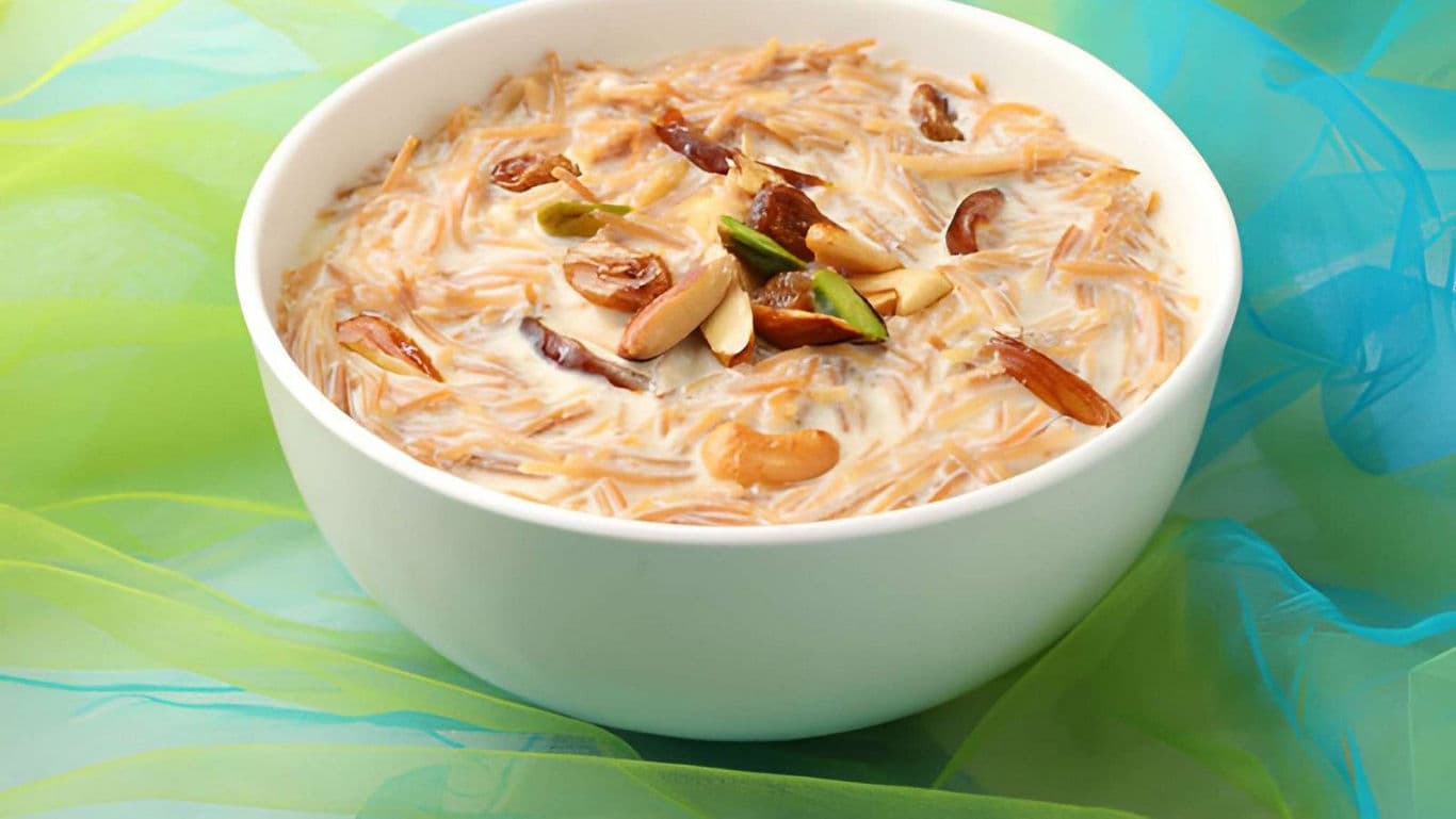 Bowl of sweet vermicelli dessert with nuts