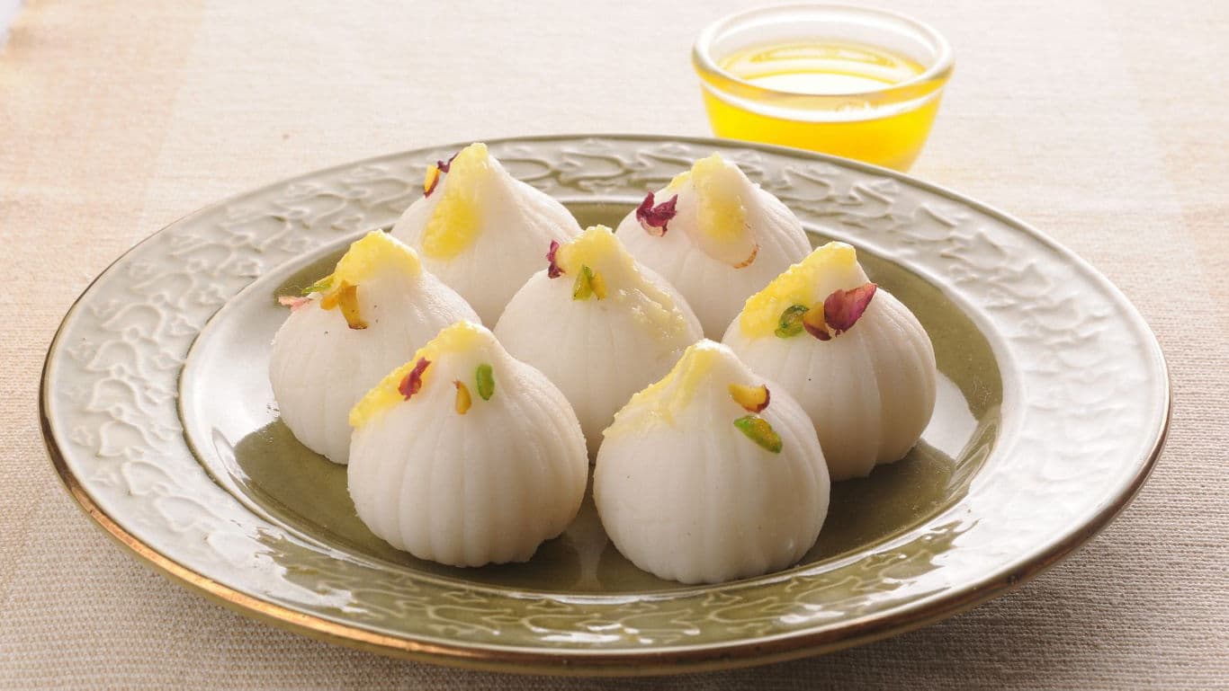 Traditional Indian modak sweets on plate