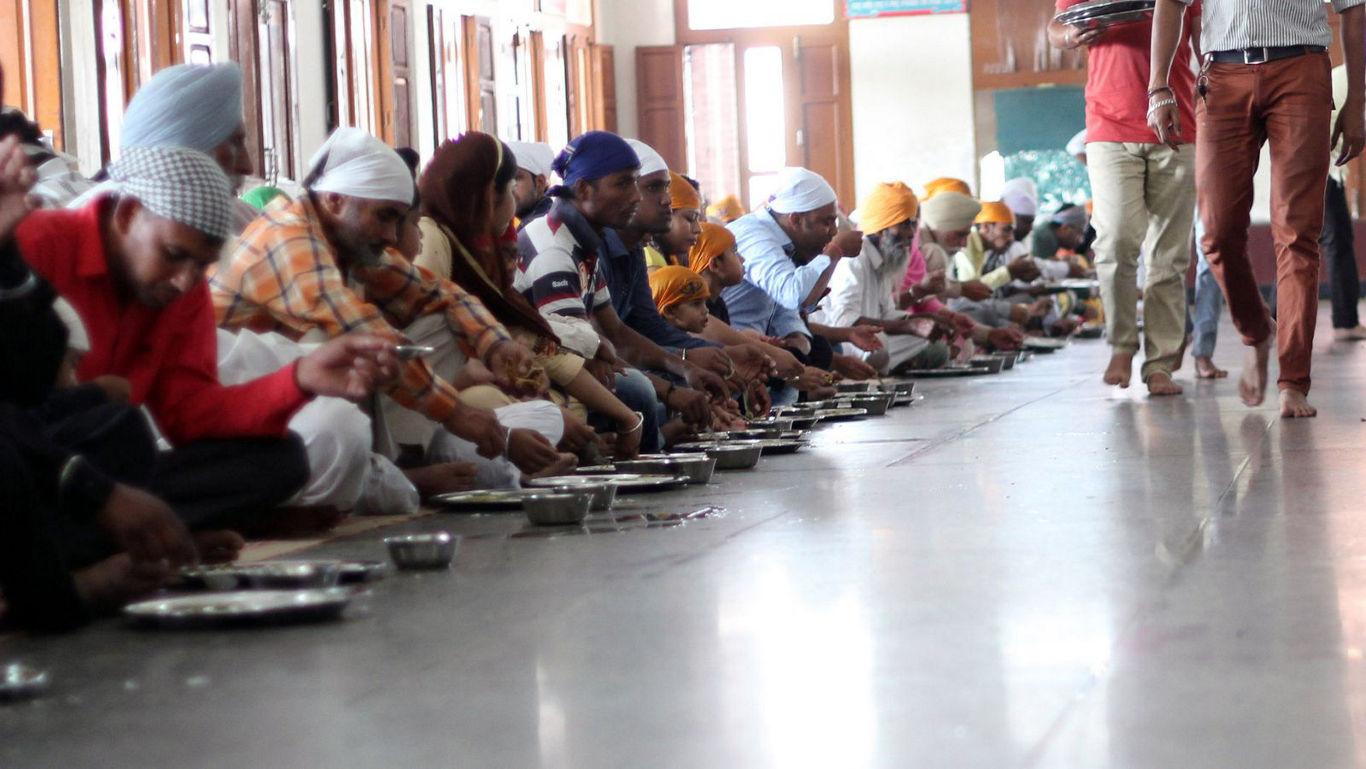 Community meal gathering in large hall