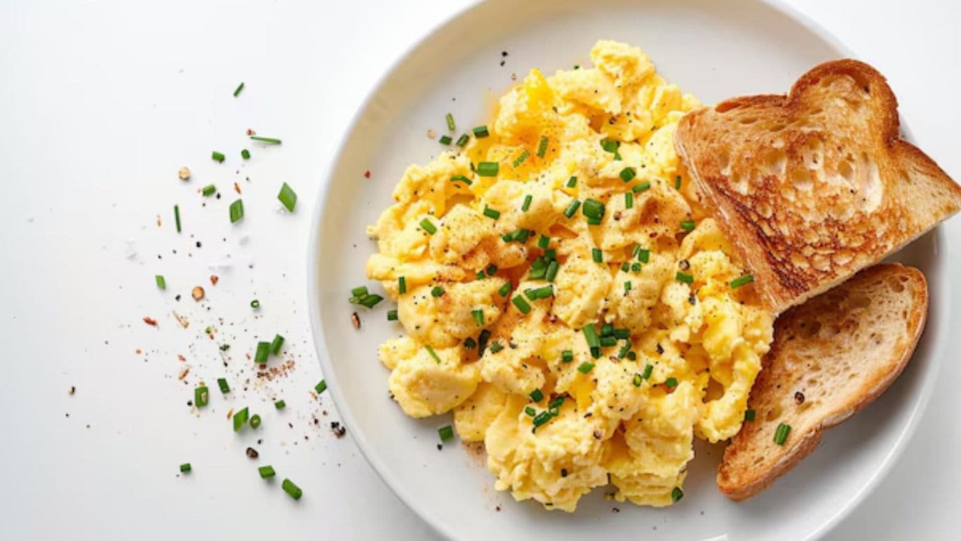 Scrambled Eggs with Toast and Fresh Chives