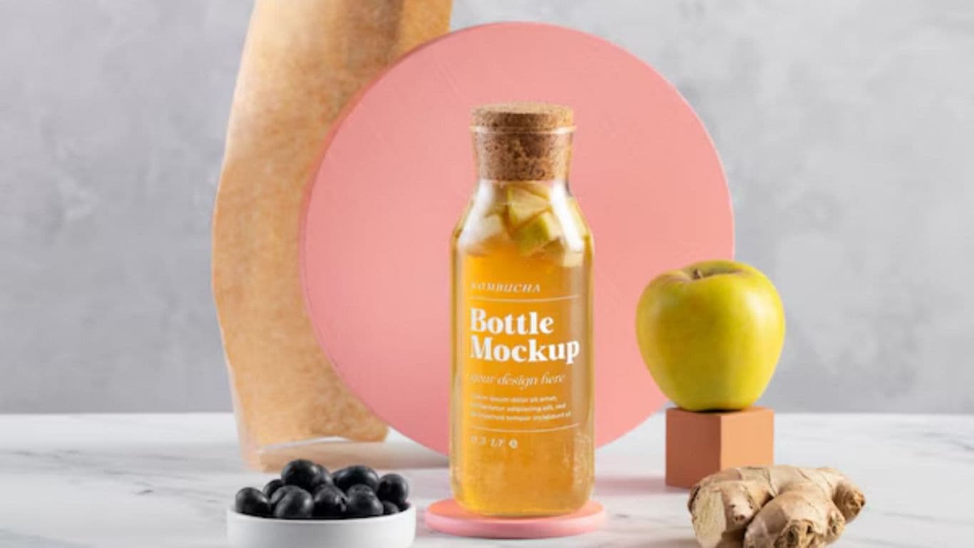 Glass bottle mockup with apple and ginger