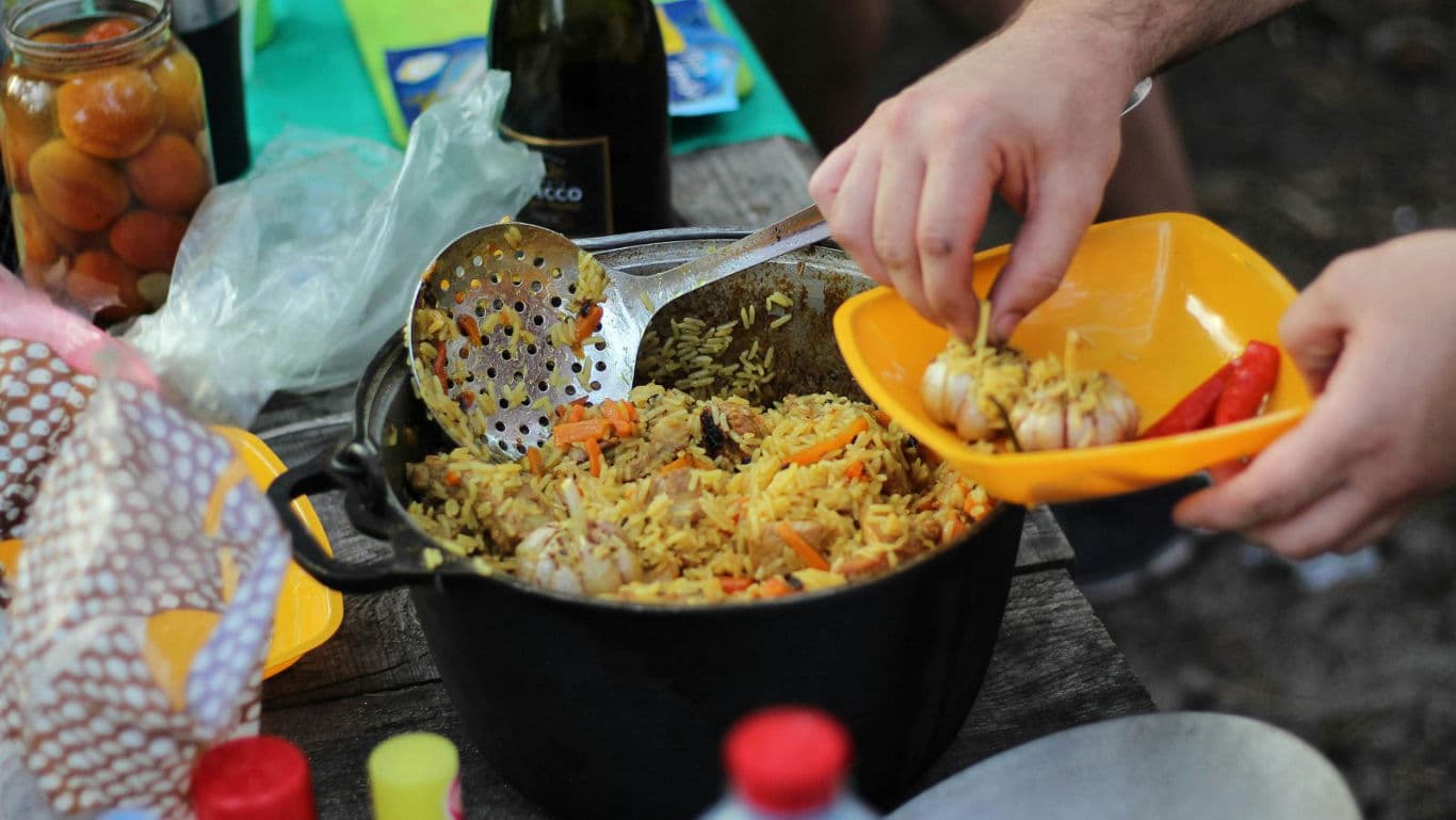 Outdoor Meal with Rice Dish and Garlic