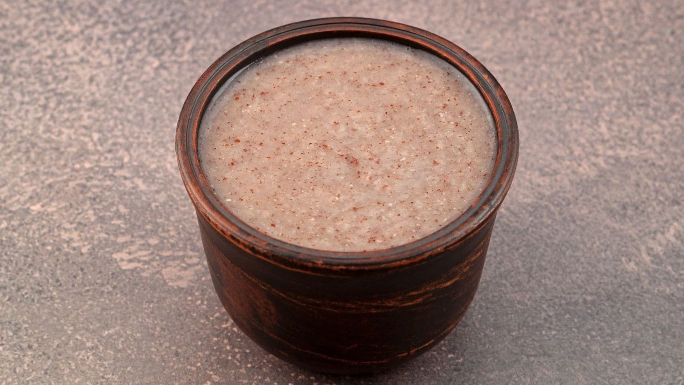 Rustic clay bowl filled with porridge