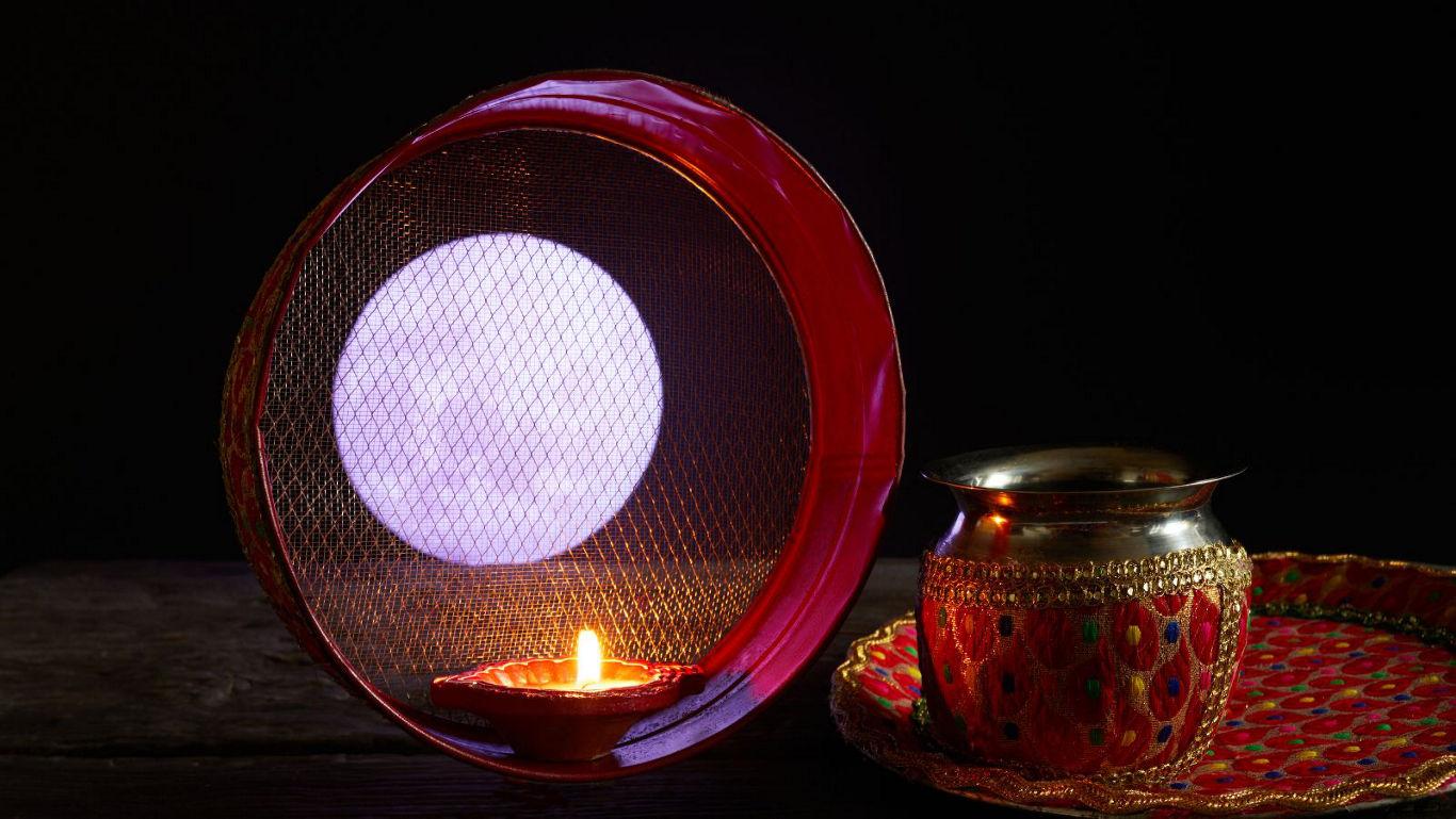 Traditional Karwa Chauth setup with moon view